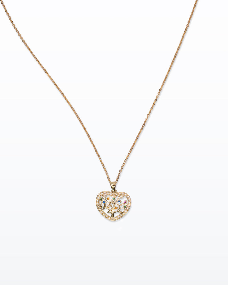 Radici Preziose – Collana oro con cuore e albero vita